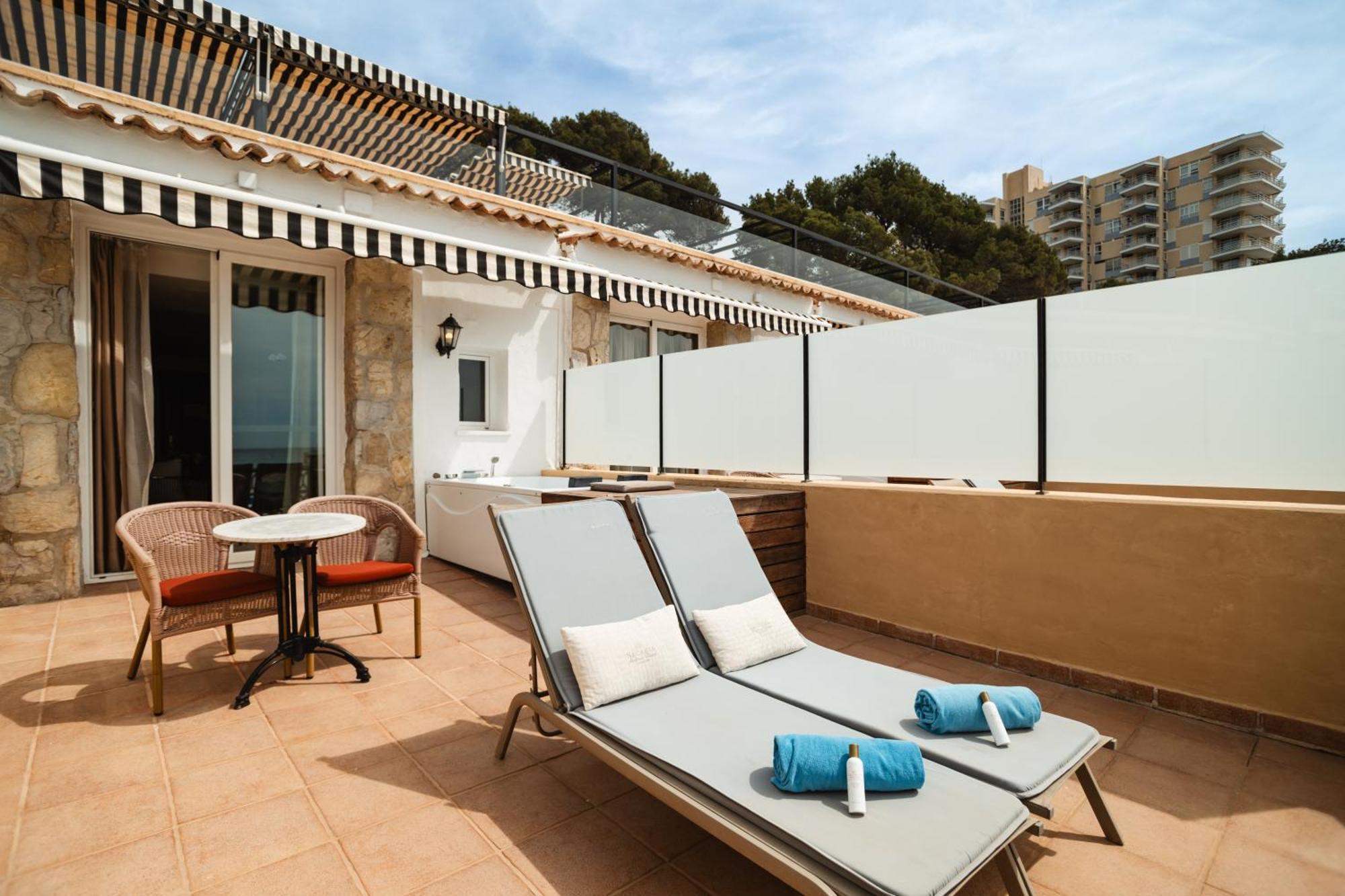 Secrets Mallorca Villamil Resort & Spa - Adults Only Peguera Exterior foto Terrace of a suite